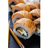 Fresh and tasty traditional Japanese sushi rolls close up