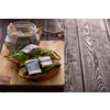 Herring sandwich (traditional Danish smorrebrod) on cutting board. Copyspace.