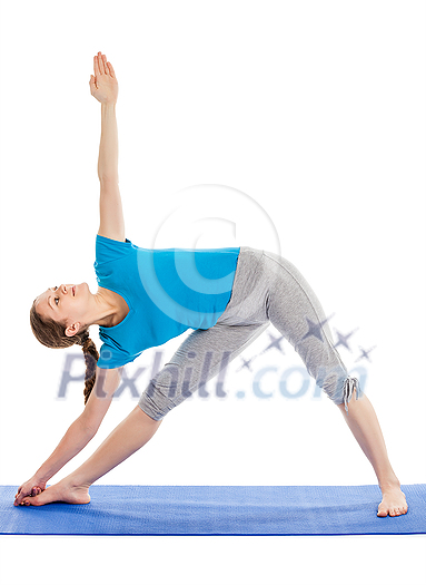 Yoga - young beautiful slender woman yoga instructor doing Triangle asana pose (utthita trikonasana) in ashtanga vinyasa style exercise isolated on white background Yoga - young beautiful slender woman yoga instructor doing Triangle asana pose (utthita trikonasana) in ashtanga vinyasa style exercise isolated on white background