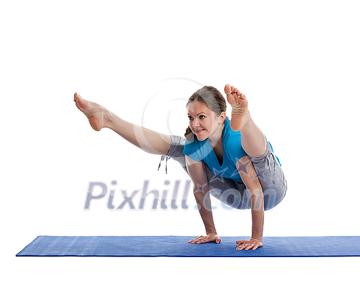 Yoga - young beautiful woman yoga instructor doing Firefly asana pose (Titibasana) exercise isolated on white background Yoga - young beautiful woman yoga instructor doing Firefly asana pose (Titibasana) exercise isolated on white background