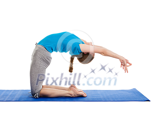 Yoga - young beautiful slender woman yoga instructor doing advanced variation of camel pose (Ustrasana) asana exercise isolated on white background Yoga - young beautiful slender woman yoga instructor doing advanced variation of camel pose (Ustrasana) asana exercise isolated on white background