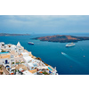 View of Fira Greek town with traditional white houses on Santorini island with cruise ships in sea. Santorini, Greece