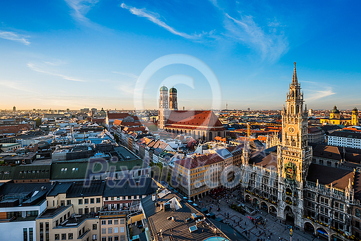 Aerial view of Munich - Marienplatz, Neues Rathaus and Frauenkirche from St. Peter's church on sunset. Munich, Germany