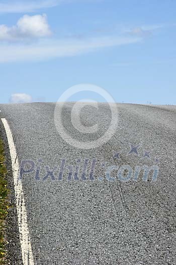 Empty road hill