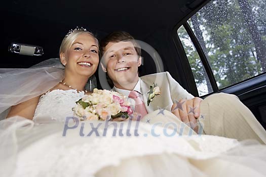 Happy couple in the car