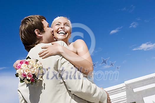Happy couple hugging Happy couple hugging
