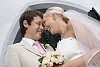 Bride and groom in front of a church