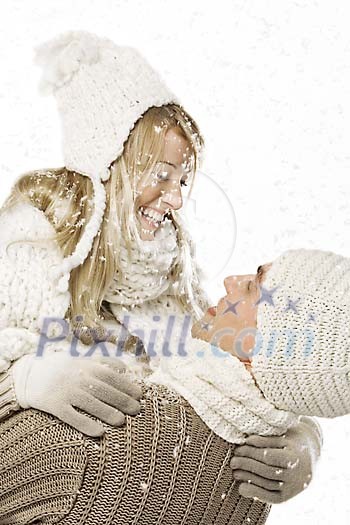 Man and woman enjoying the snow Man and woman enjoying the snow