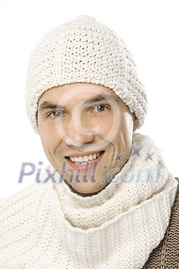 Man smiling with hat and scarf Man smiling with hat and scarf