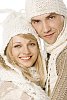 Couple in winter clothes being happy 
