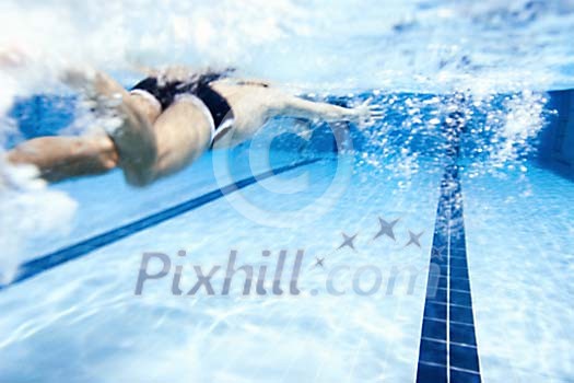 Man swimming in the pool Man swimming in the pool