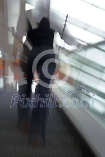 Woman going up the stairs Woman going up the stairs