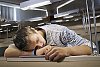 Boy sleeping in the classroom