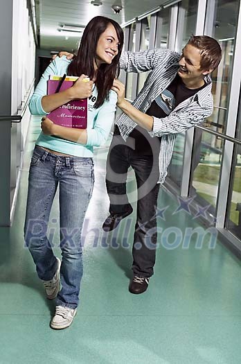Boy and a girl in the hallway Boy and a girl in the hallway