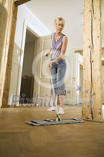 Woman cleaning the floor