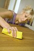 Woman cleaning the table