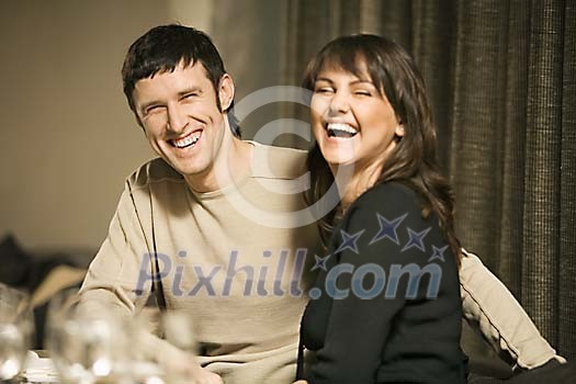 Man and woman laughing