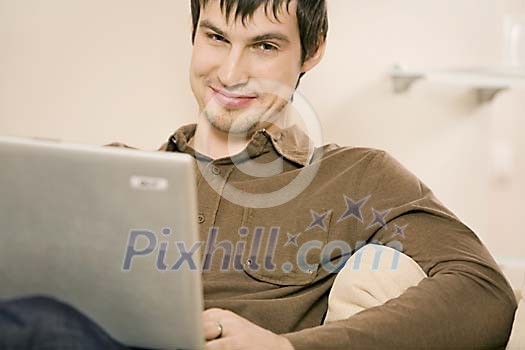 Man sitting with laptop Man sitting with laptop