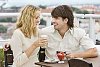 Couple having a snack in the outdoor cafeteria