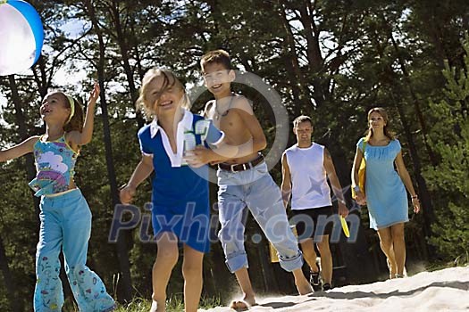 Family going to the beach Family going to the beach