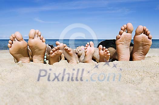 Family lying, only feet showing Family lying, only feet showing