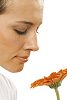 Woman with gerbera closeup