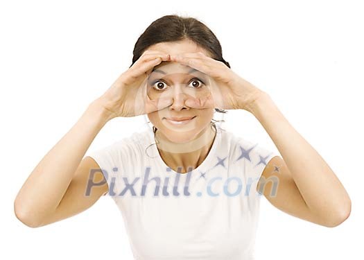Woman looking, hands placed like holding binoculars Woman looking, hands placed like holding binoculars