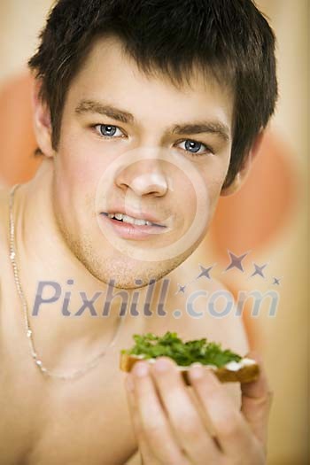 Man with sandwich in his hand Man with sandwich in his hand