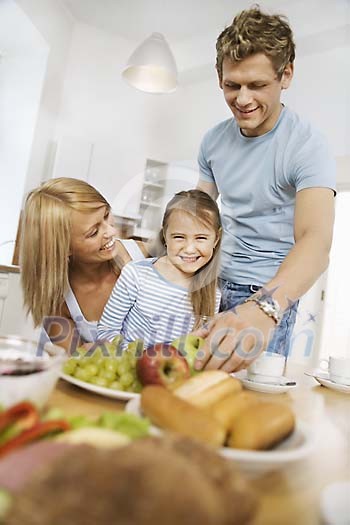 Family having breakfast in the kitchen