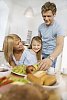 Family having breakfast in the kitchen