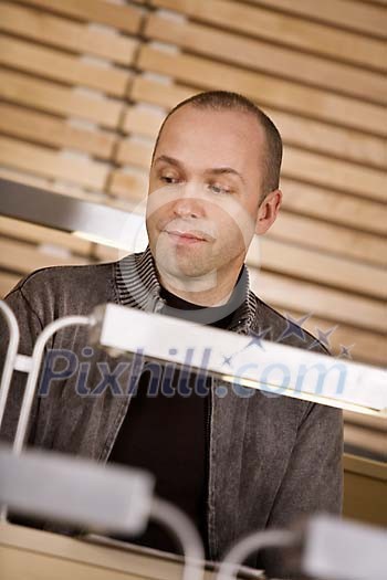 Man sitting in the classroom Man sitting in the classroom