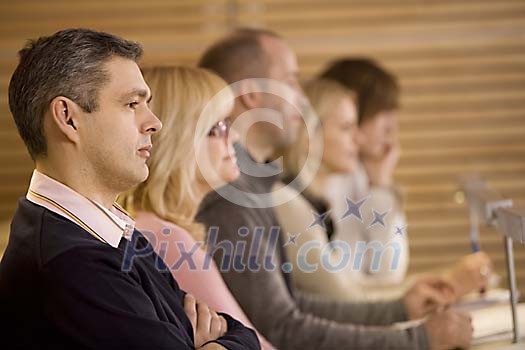 Group of adults in the classroom Group of adults in the classroom