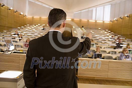 Lecturer in front of class Lecturer in front of class
