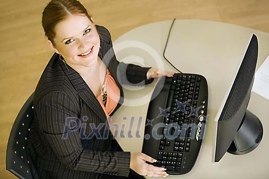 Woman looking up from her table