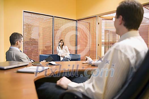 Two men and a woman in the office Two men and a woman in the office
