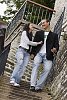 Couple coming down of the stairs