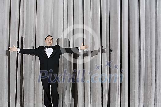 Man standing on a stage Man standing on a stage