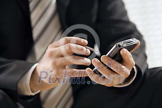 Businessman checking appointments Businessman checking appointments