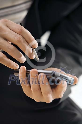 Businessman checking appointments Businessman checking appointments