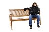 Man sitting on the bench in winter clothes