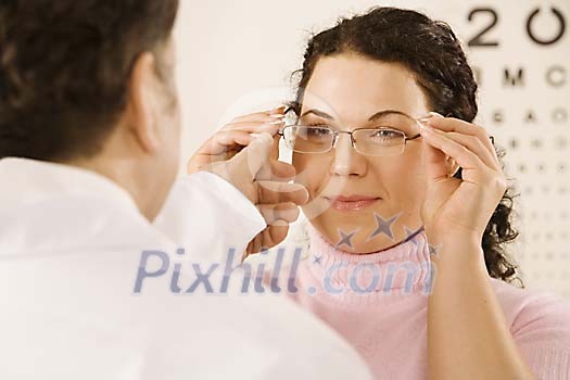Woman at the eye doctor appointment Woman at the eye doctor appointment