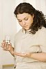 Woman taking her medicine