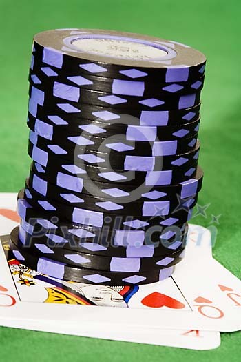 Tower of chips on cards