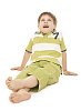 Boy sitting on the ground, looking up