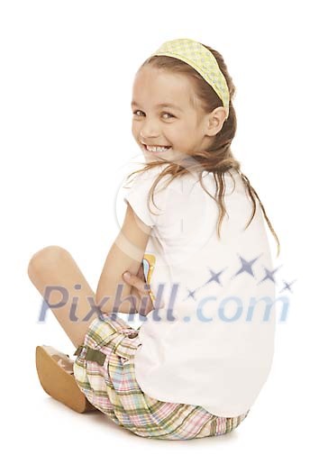 Girl sitting and smiling over her shoulder Girl sitting and smiling over her shoulder