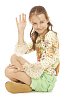 Girl sitting and waving