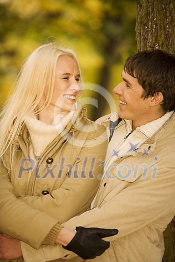 Couple hugging in the park Couple hugging in the park