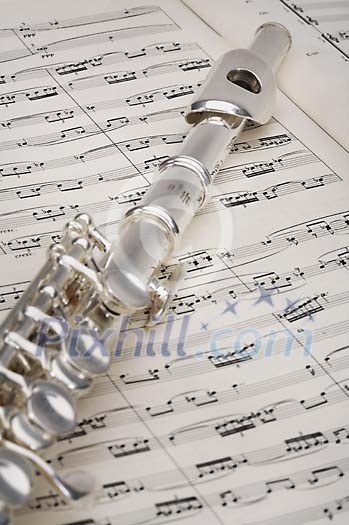 Flute with sheet notes Flute with sheet notes
