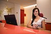 Woman sitting behind desk