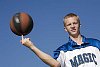 Boy spinning the ball on the finger